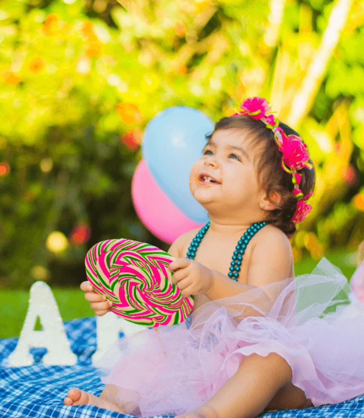 a child with a giant lolly